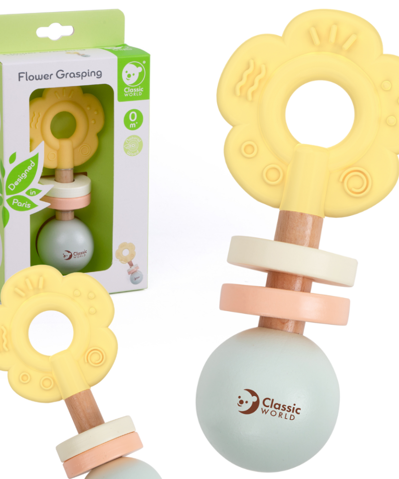 Pastelne lillekujuline beebikõristi käes