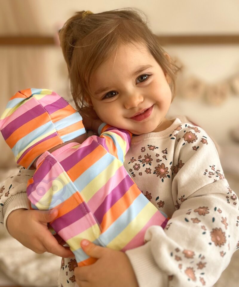 Ükssarvikuteemaline body ja müts nukule