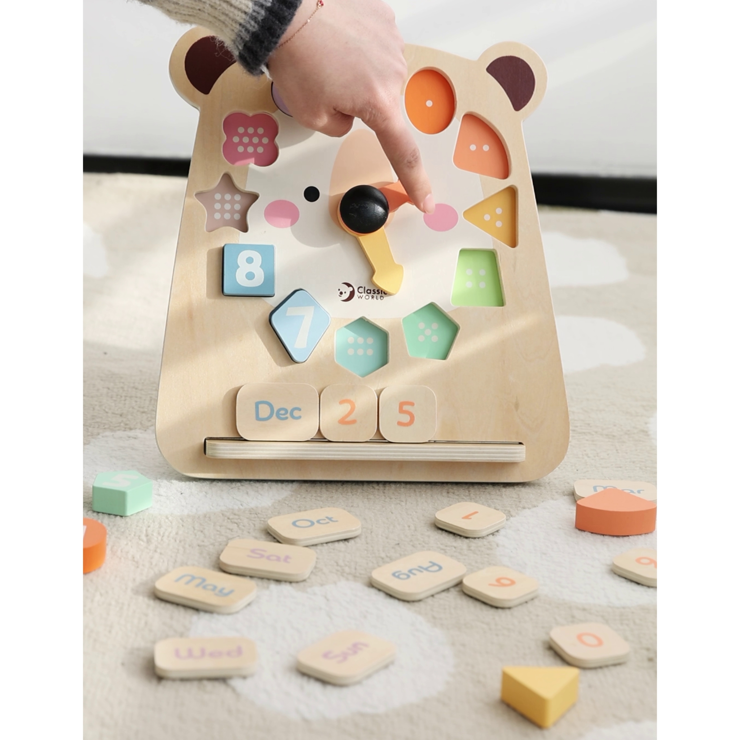 Laste mängukell värvide ja kujunditega