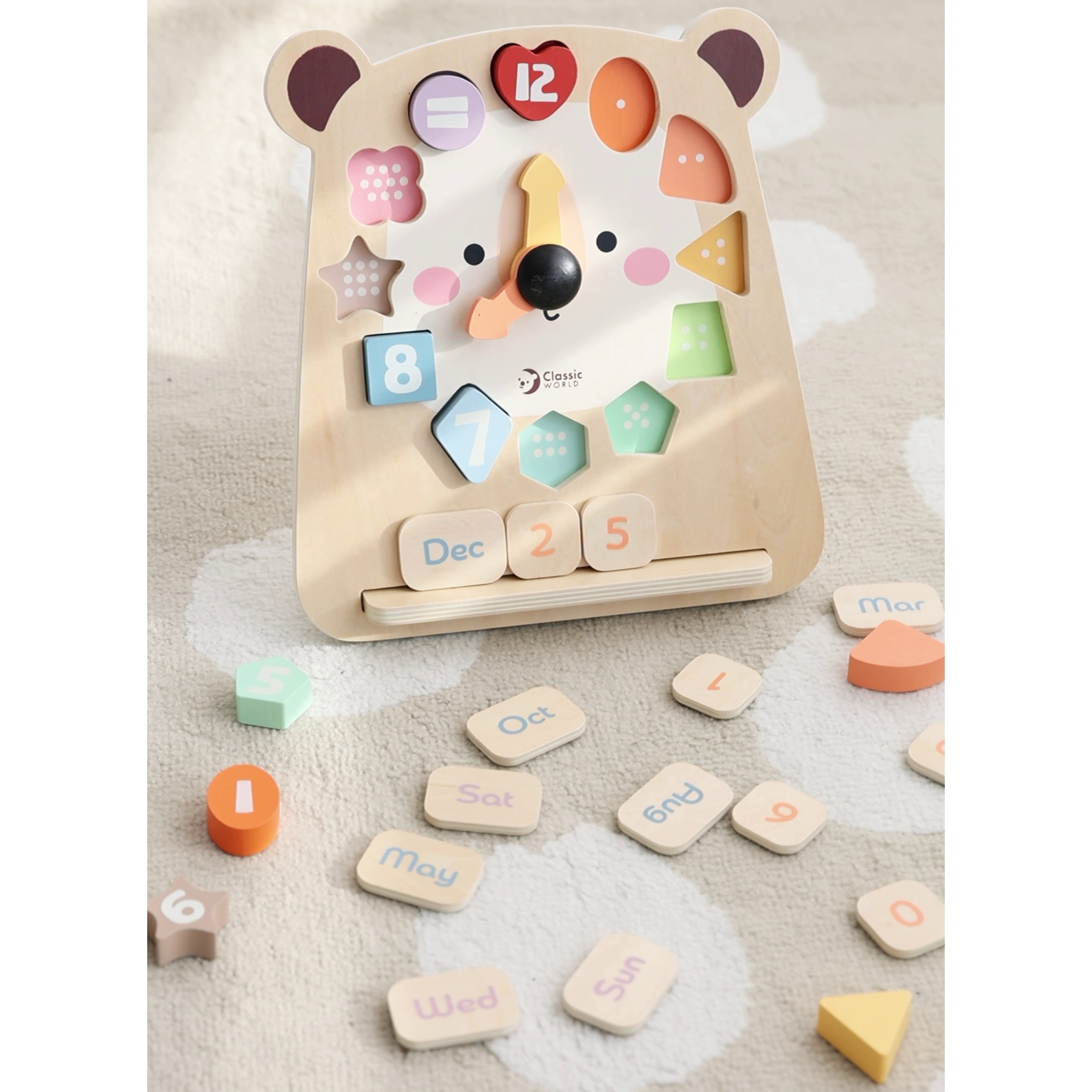 Karukujundusega puidust mängukell