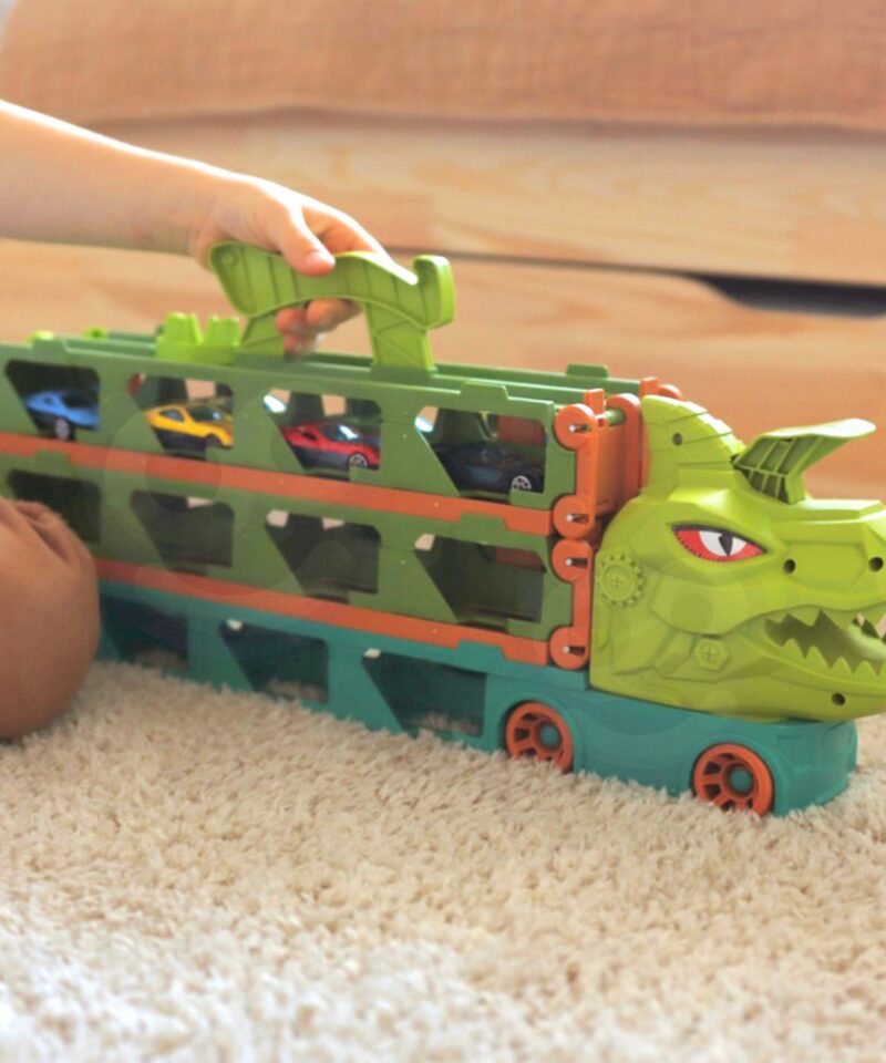 Dinosauruse kujuline mängutransporter