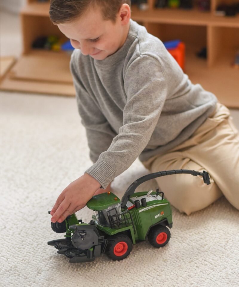 Laste mängukombain suurte ratastega