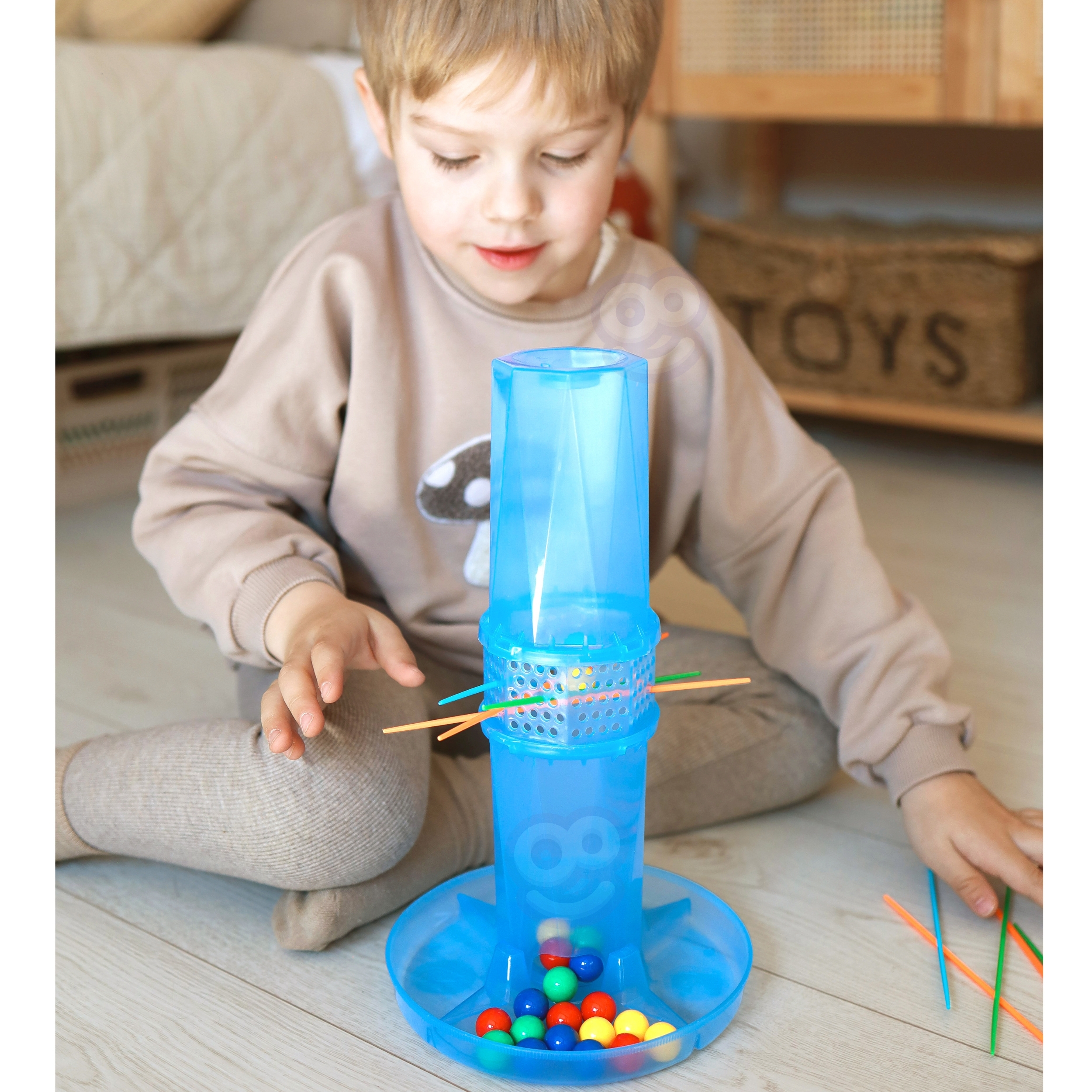 Osavusmäng värviliste kuulide ja pulkadega