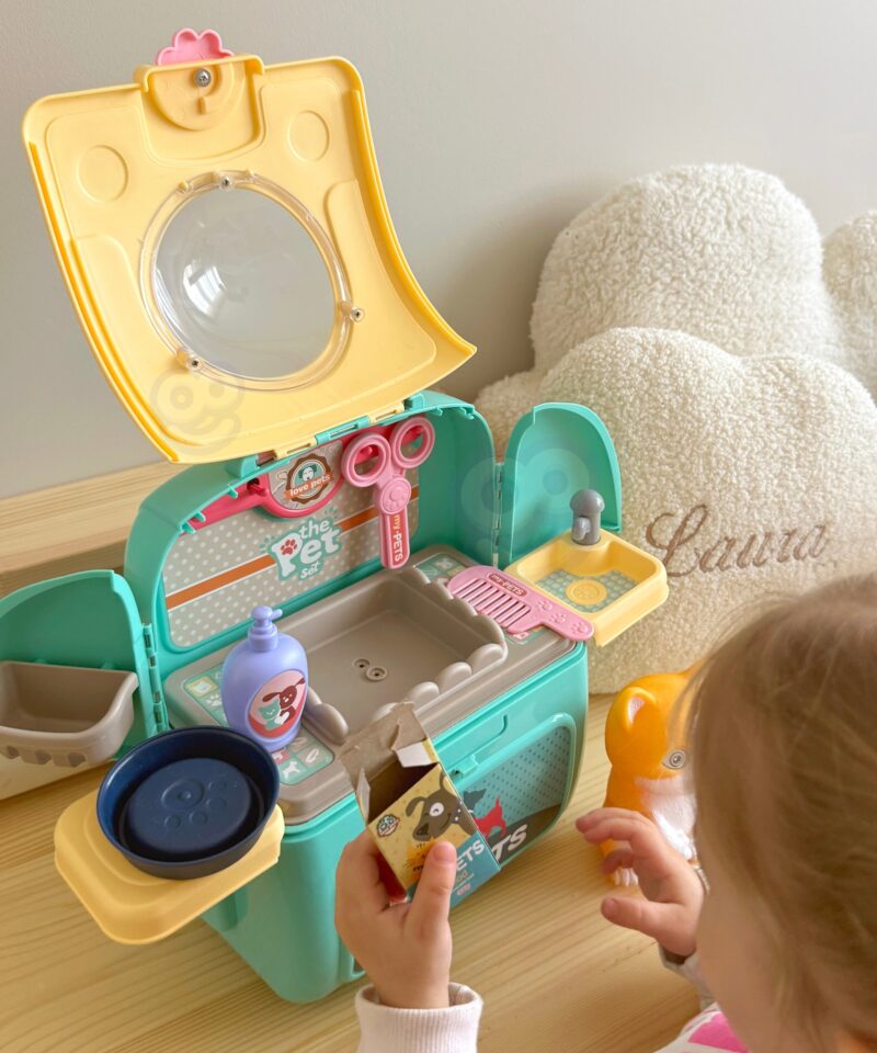 Laste seljakott mänguasjadega