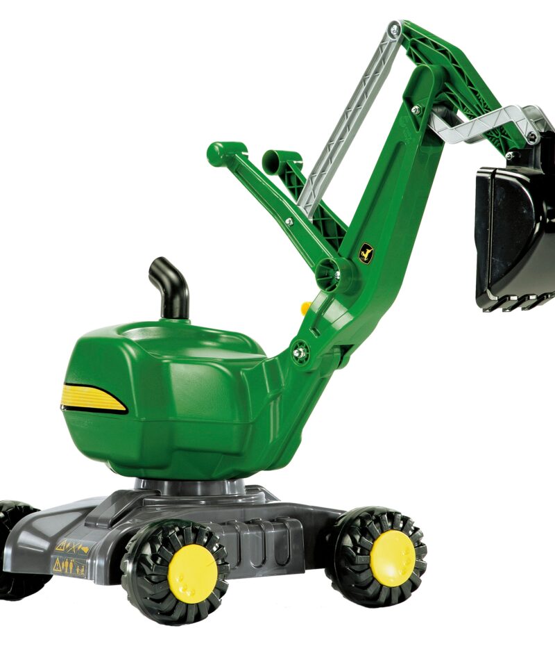 Lastele mõeldud rohekollane ekskavaator mänguplatsil
