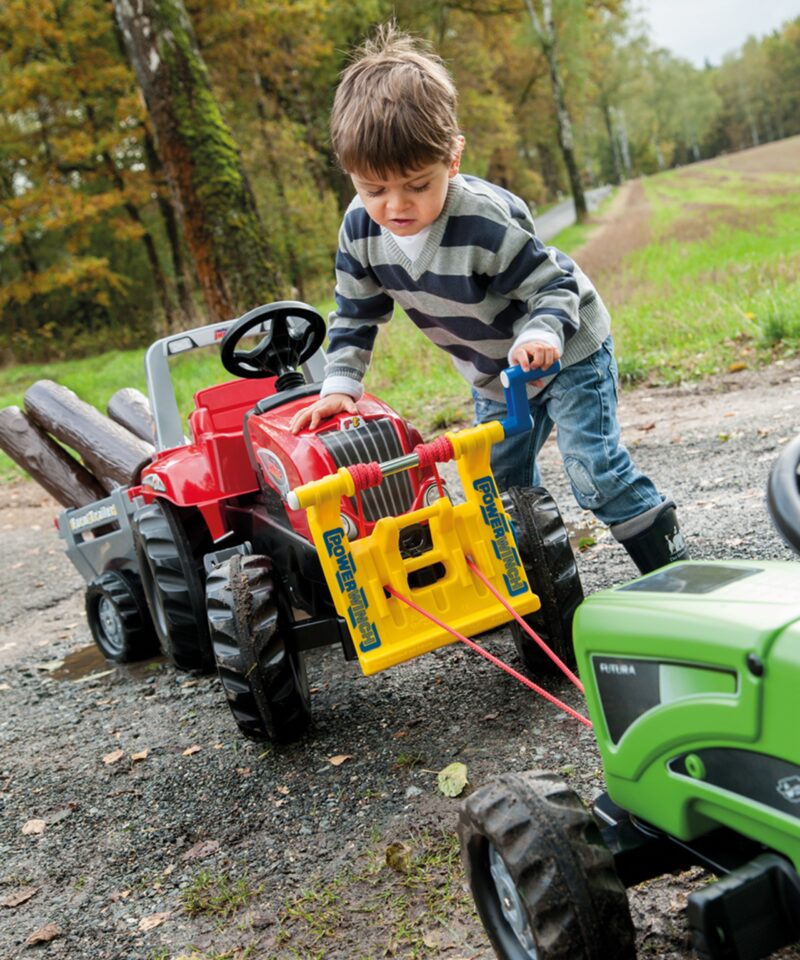 Laste traktor reguleeritava istmega