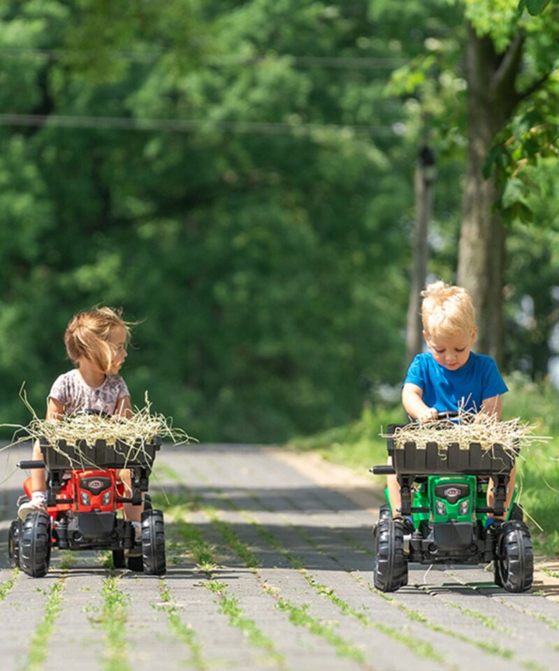 Mängutraktor liikuva esikopaga