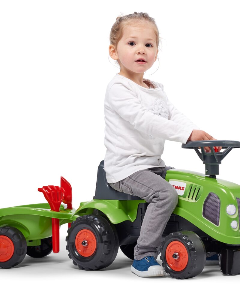 Arendav mänguasi väikesele traktoristile