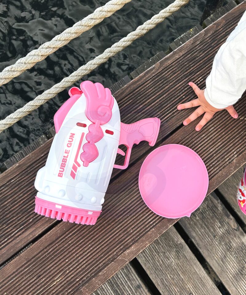 Ergonoomilise disainiga roosa mullipüstol