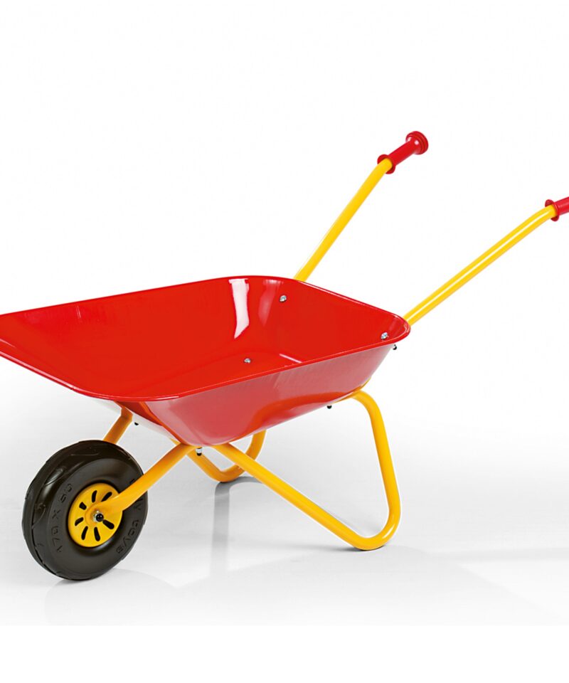 Punane laste aiakäru aias