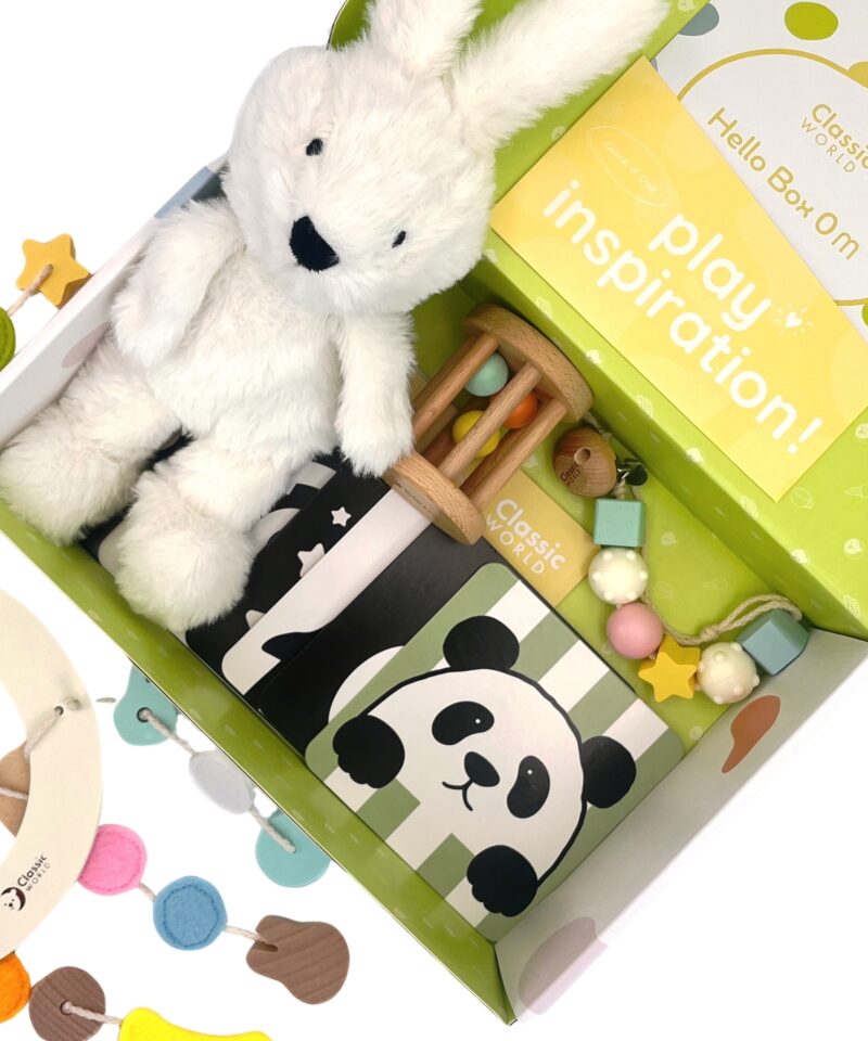 Pastelne kinkekarp beebimänguasjadega