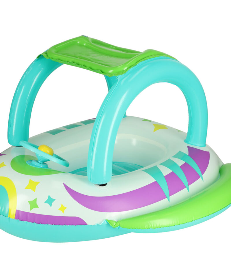 Laste täispuhutav paat rooliga rannas