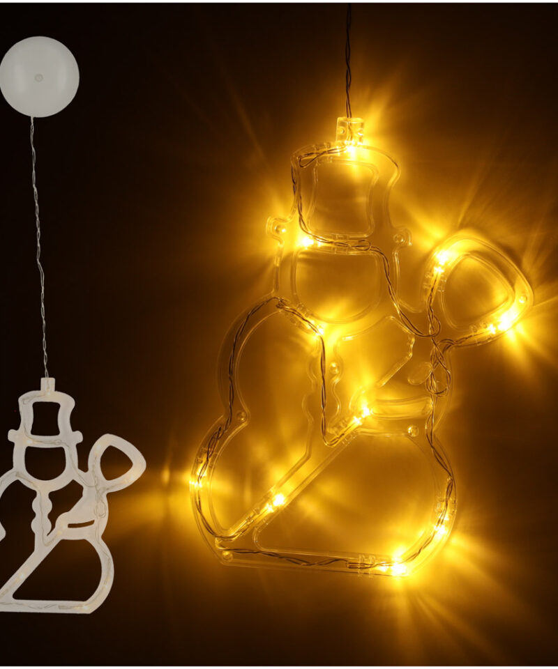 Jõuluteemaline LED lumememme lamp aknal