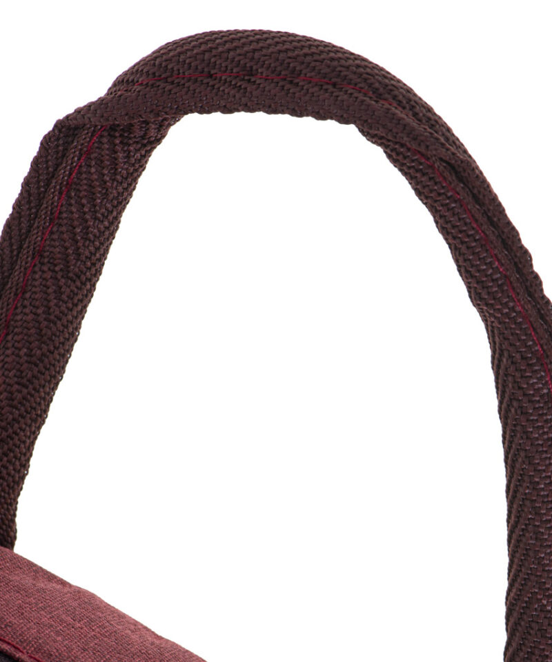 Punane lõunakott koos söögiriistadega