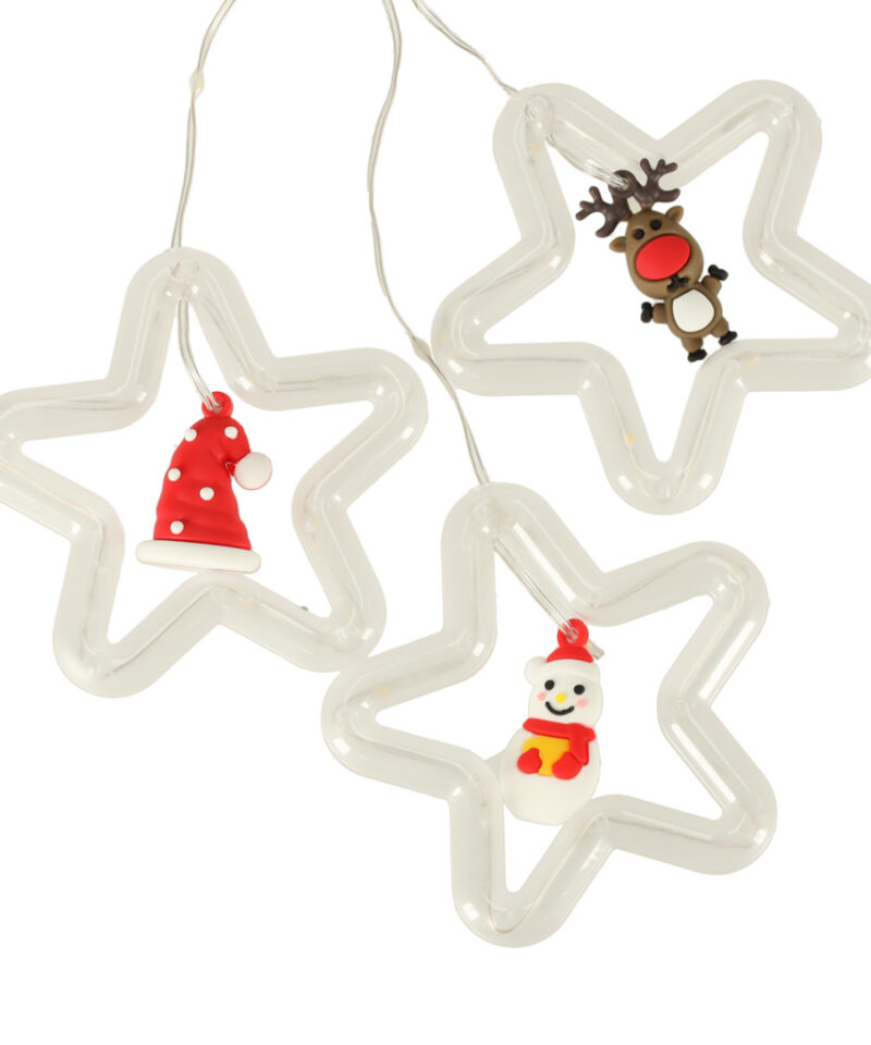 Jõulutähtedega valguskardin elutoas