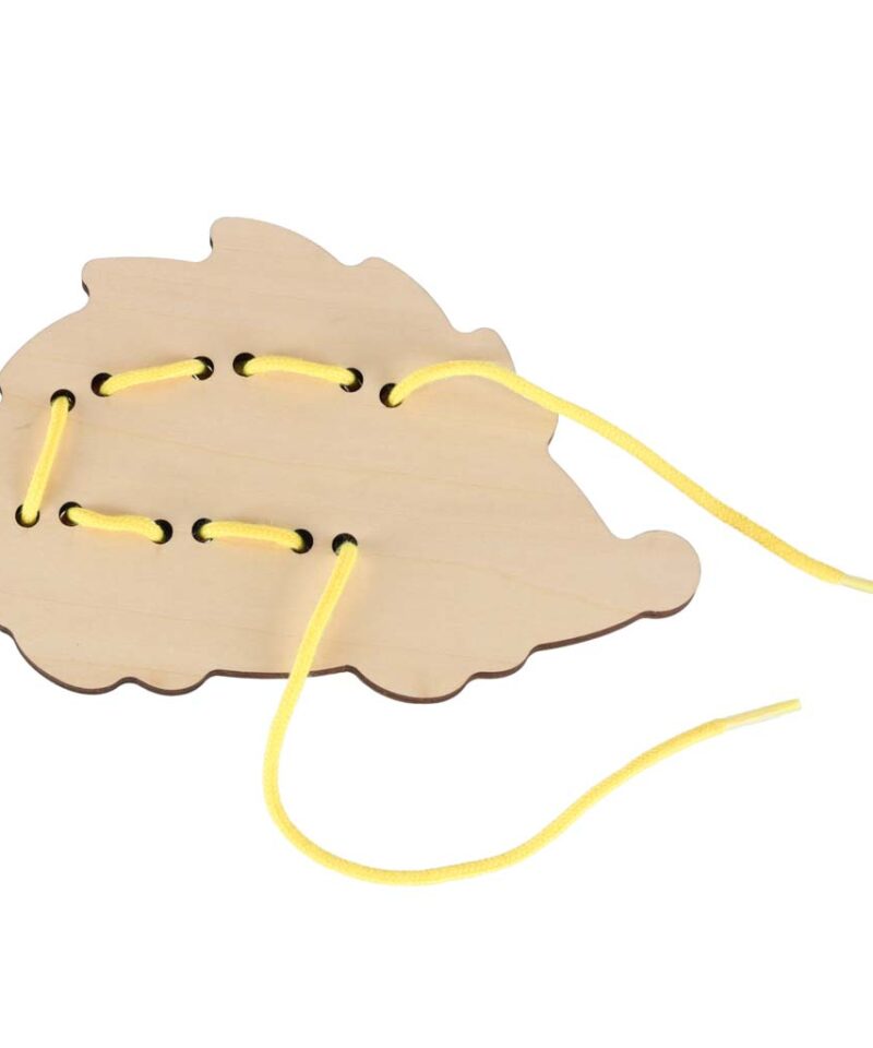 Nööbiõmbluse komplekt arendab oskusi