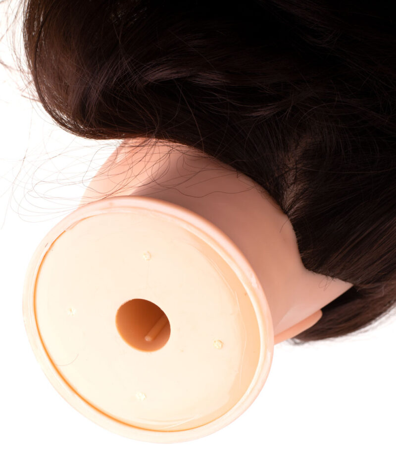 Juuksuri treeningpea koos paigutussüsteemiga